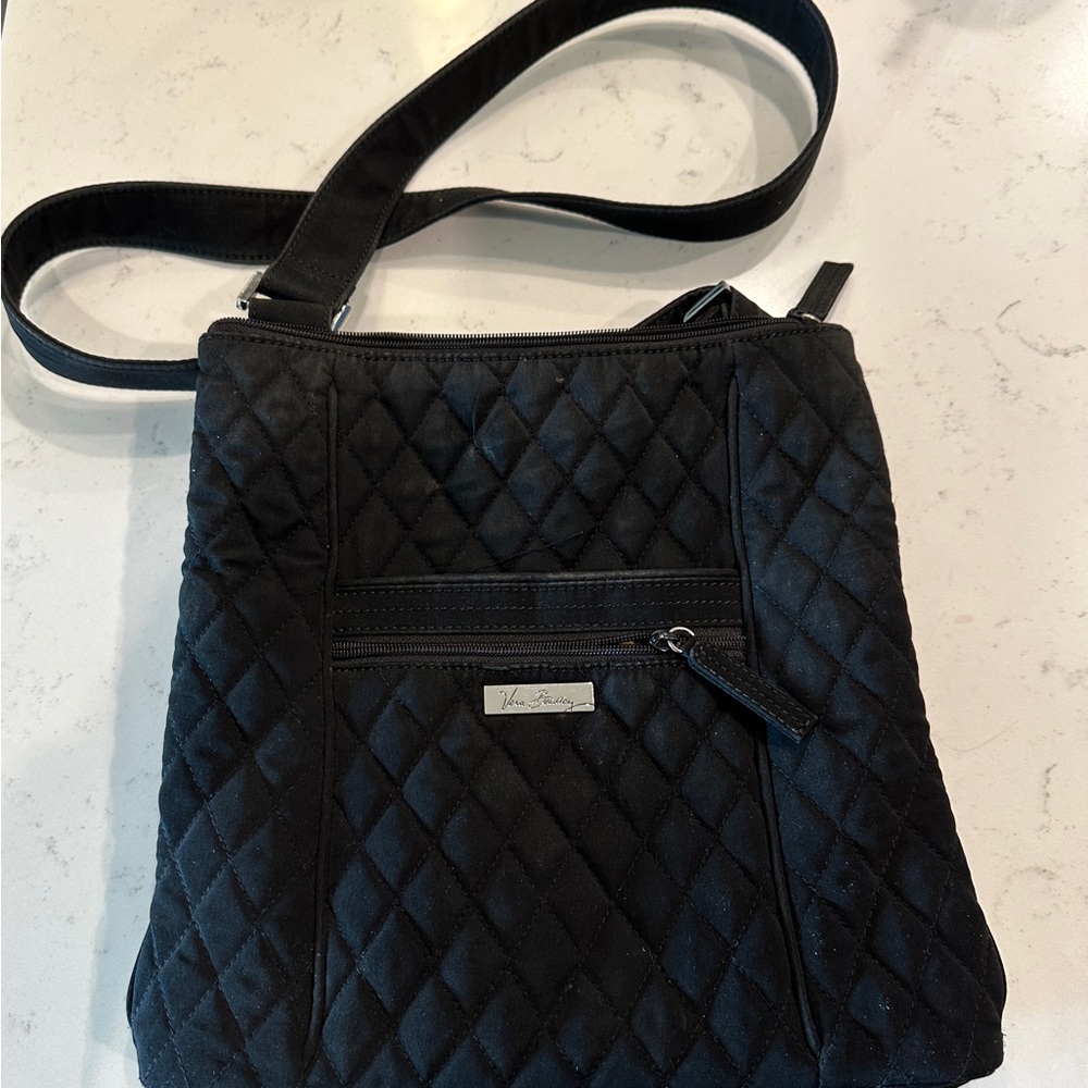 Vera Bradley quilted crossbody bag.